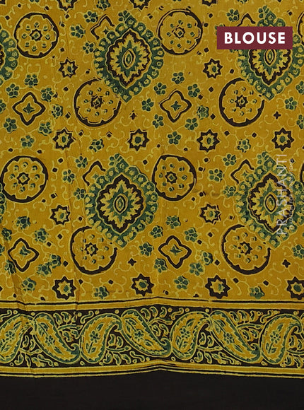 Dola silk saree yellow with allover floral butta prints and zari woven border