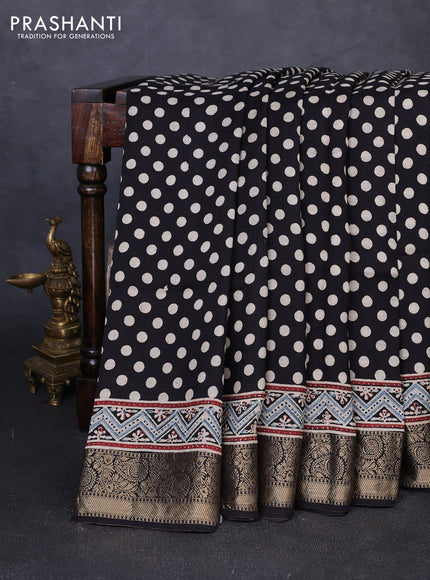 Dola silk saree blue shade and maroon with allover ajrakh prints and zari woven border