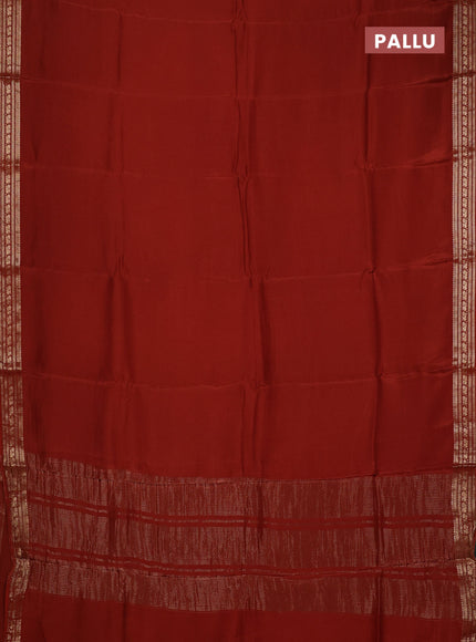 Semi mysore silk saree rust shade with plain body and zari woven border