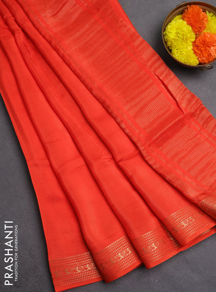Semi mysore silk saree orange with plain body and zari woven border