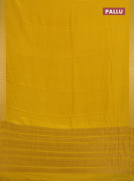 Semi mysore silk saree yellow with plain body and temple design zari woven border