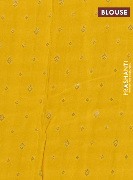 Semi mysore silk saree yellow with plain body and temple design zari woven border
