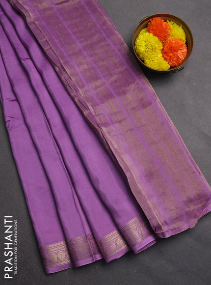 Semi mysore silk saree lavender with plain body and temple design zari woven border