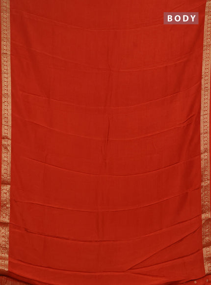 Semi mysore silk saree rustic orange with plain body and temple design zari woven border