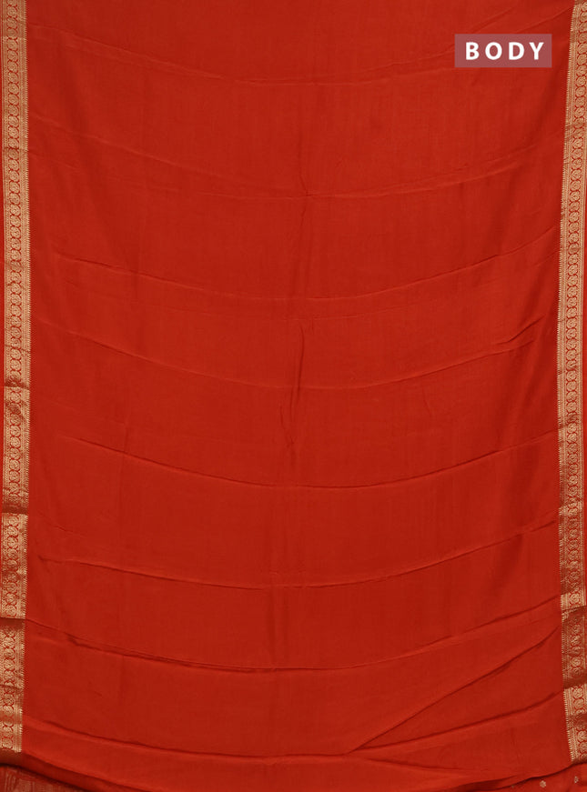 Semi mysore silk saree rustic orange with plain body and temple design zari woven border
