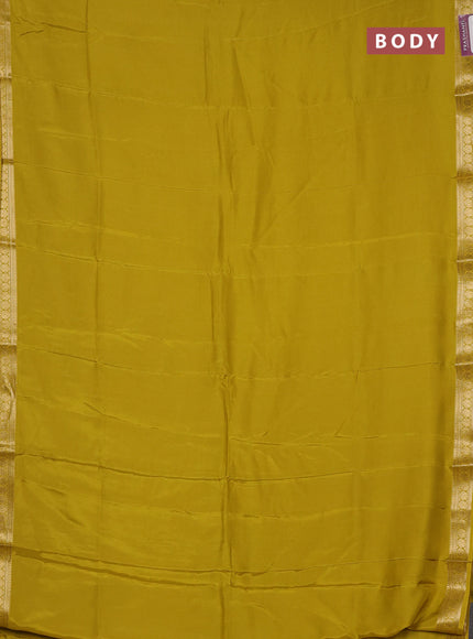 Semi mysore silk saree mustard yellow with plain body and temple design zari woven border