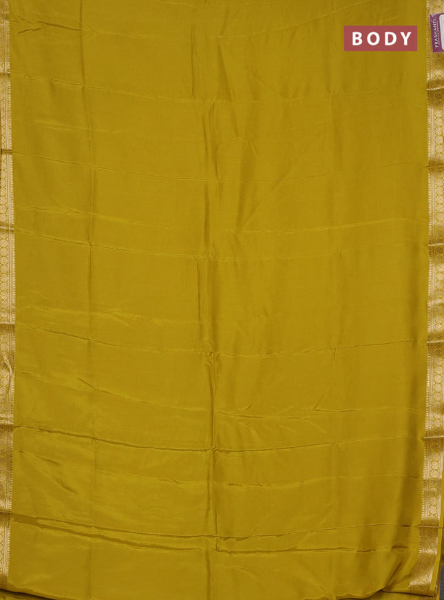 Semi mysore silk saree mustard yellow with plain body and temple design zari woven border