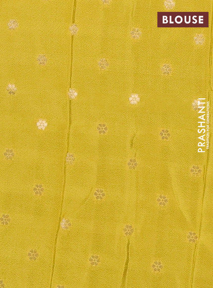 Semi mysore silk saree mustard yellow with plain body and temple design zari woven border