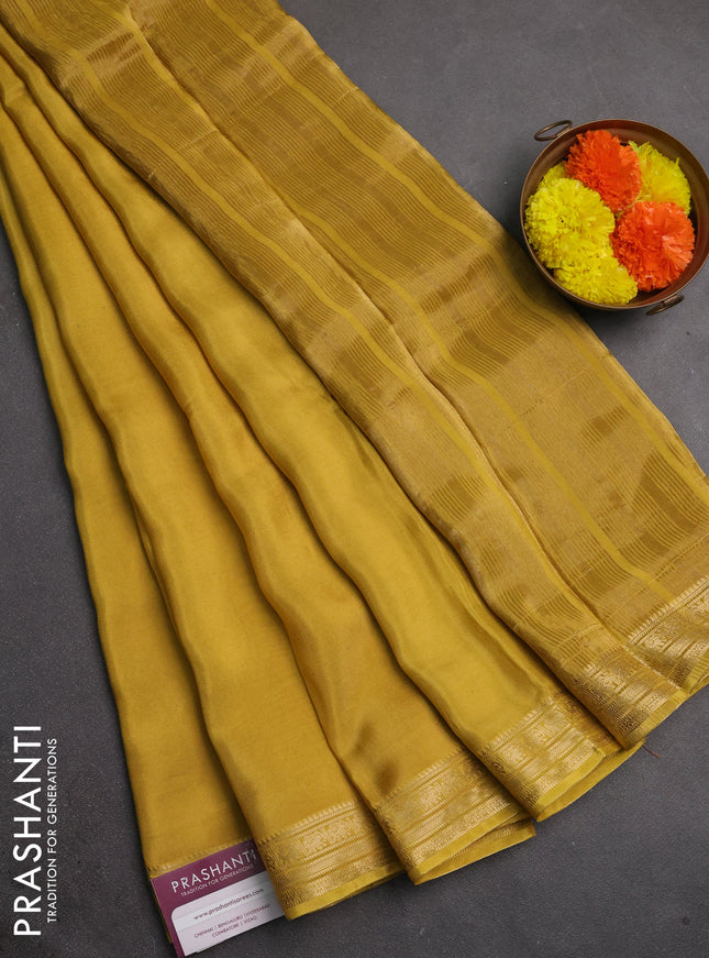Semi mysore silk saree mustard yellow with plain body and temple design zari woven border