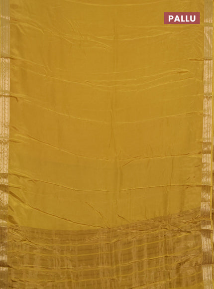 Semi mysore silk saree mustard yellow with plain body and temple design zari woven border