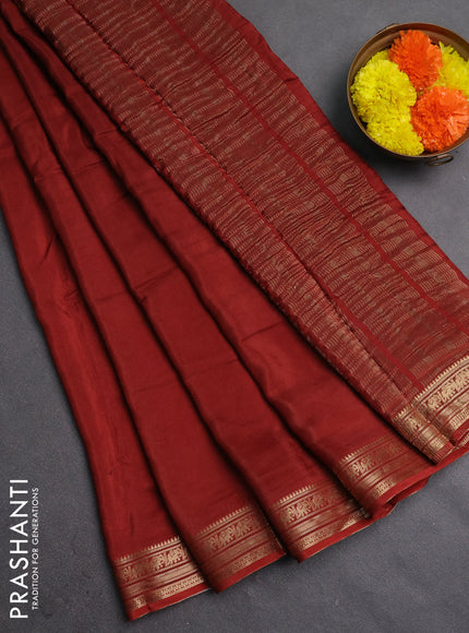 Semi mysore silk saree rust shade with plain body and temple design zari woven border
