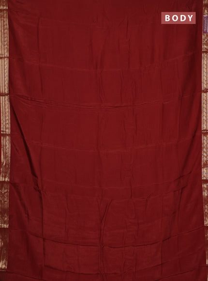Semi mysore silk saree rust shade with plain body and temple design zari woven border