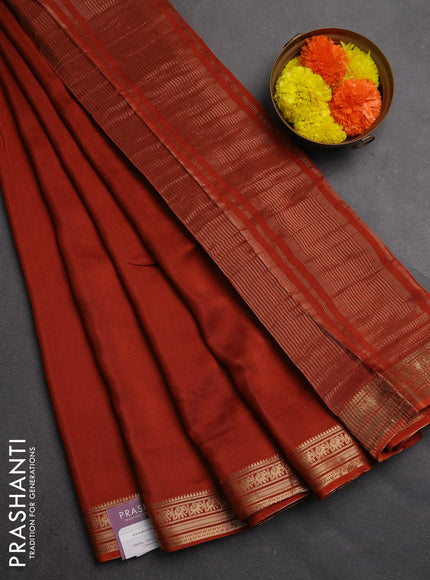 Semi mysore silk saree rust shade with plain body and temple design zari woven border