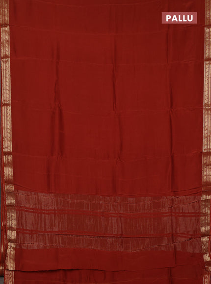 Semi mysore silk saree rust shade with plain body and temple design zari woven border