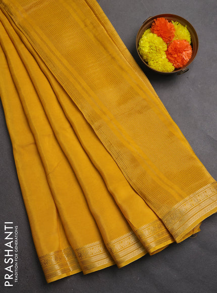 Semi mysore silk saree mustard yellow with plain body and temple design zari woven border