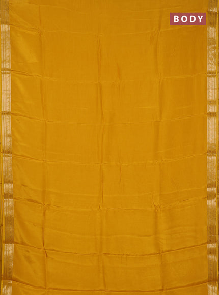 Semi mysore silk saree mustard yellow with plain body and temple design zari woven border