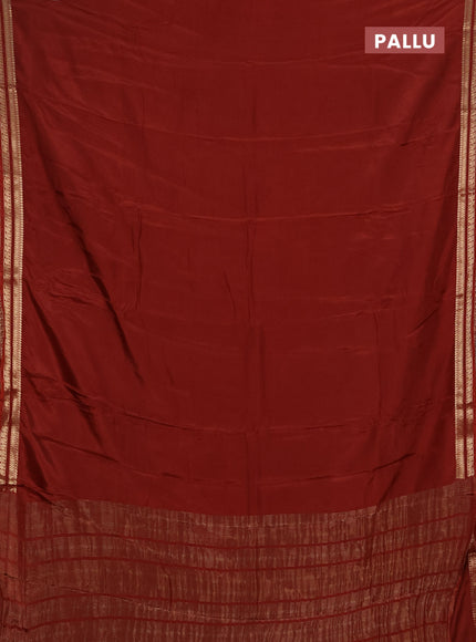 Semi mysore silk saree rust shade with plain body and zari woven border