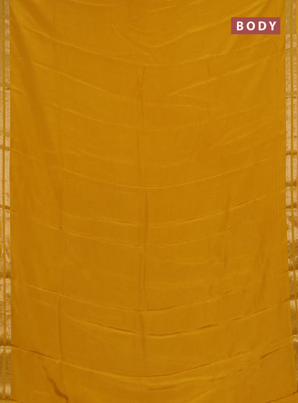 Semi mysore silk saree yellow with plain body and zari woven border