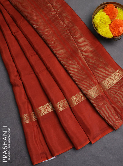 Semi mysore silk saree rust shade with plain body and zari woven simple border