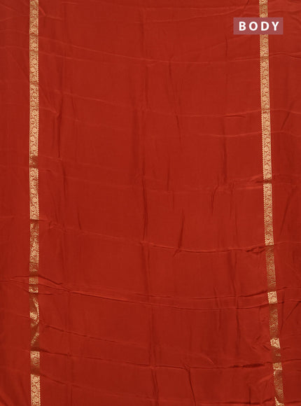 Semi mysore silk saree rust shade with plain body and zari woven simple border