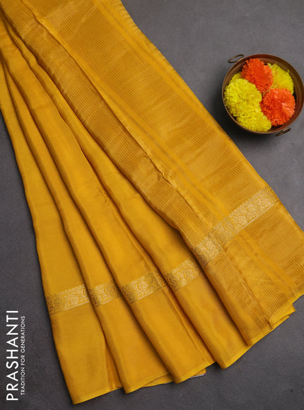 Semi mysore silk saree mustard yellow with plain body and zari woven simple border