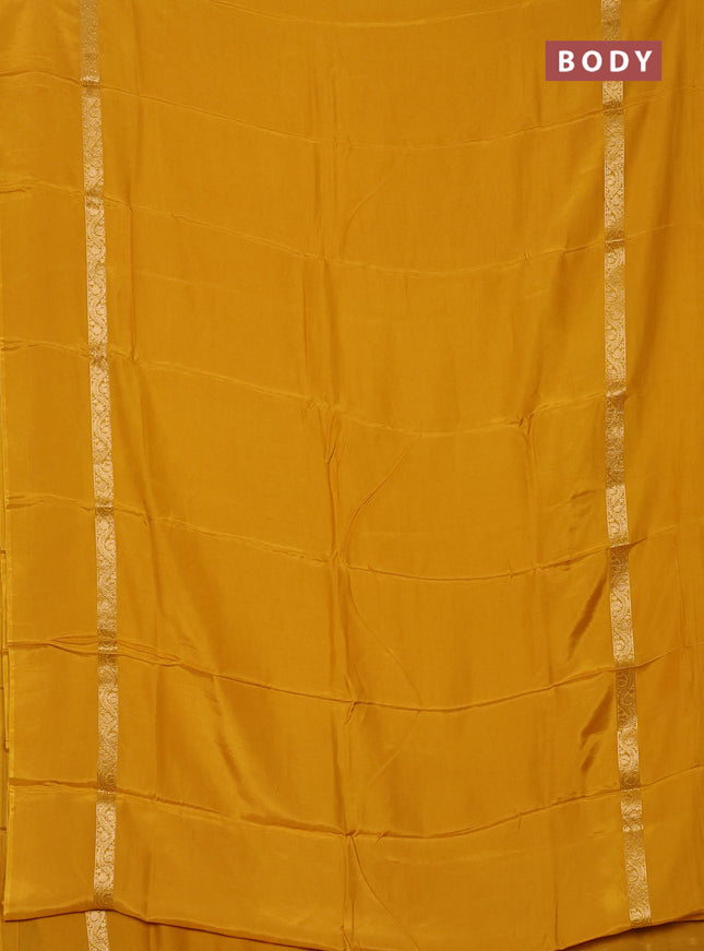 Semi mysore silk saree mustard yellow with plain body and zari woven simple border