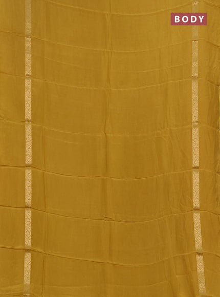 Semi mysore silk saree mustard yellow with plain body and zari woven simple border