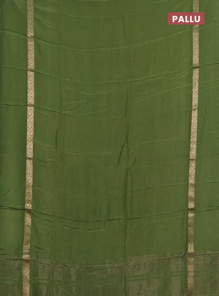 Semi mysore silk saree green with plain body and zari woven simple border