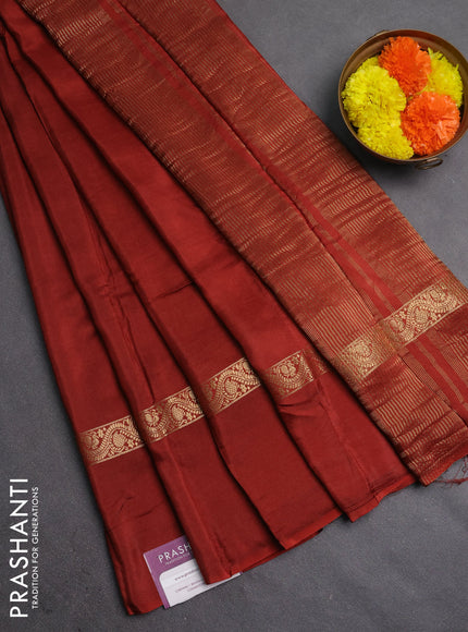 Semi mysore silk saree rust shade with plain body and zari woven simple border