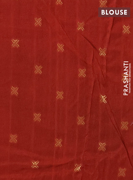 Semi mysore silk saree rust shade with plain body and zari woven simple border