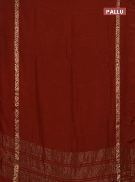 Semi mysore silk saree rust shade with plain body and zari woven simple border