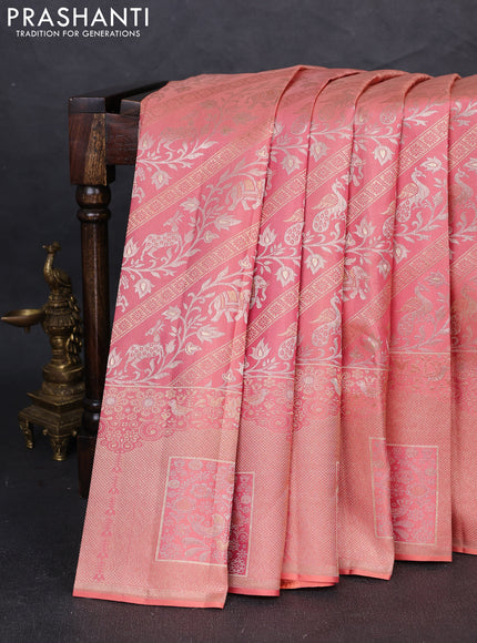 Pure kanchipuram silk saree peach shade with allover zari woven brocade weaves and long zari woven border