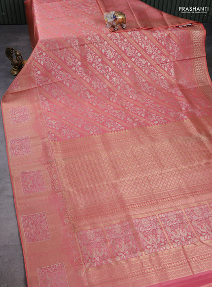 Pure kanchipuram silk saree peach shade with allover zari woven brocade weaves and long zari woven border