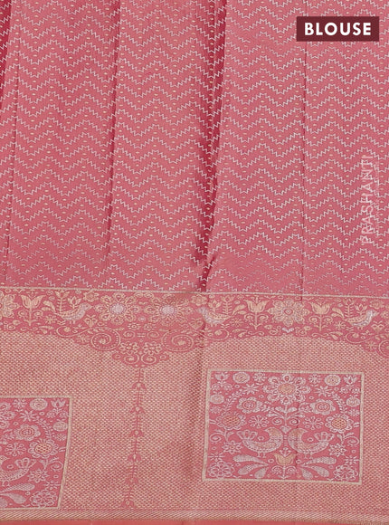 Pure kanchipuram silk saree peach shade with allover zari woven brocade weaves and long zari woven border