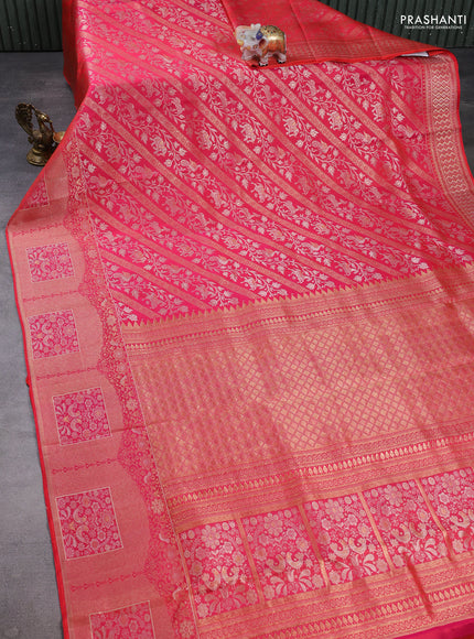Pure kanchipuram silk saree dual shade of pinkish orange with allover zari woven brocade weaves and long zari woven border