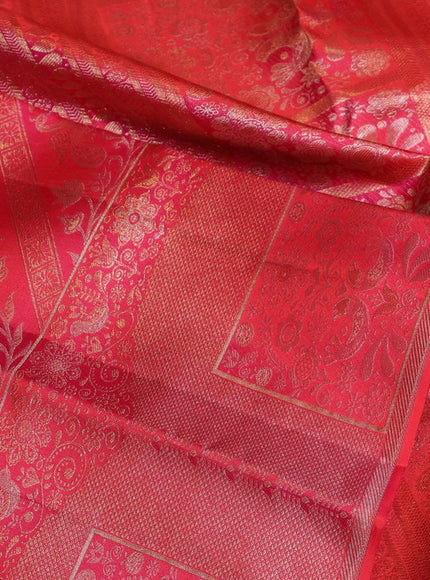Pure kanchipuram silk saree dual shade of pinkish orange with allover zari woven brocade weaves and long zari woven border