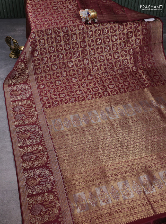 Pure kanchipuram silk saree wine shade with allover zari woven brocade weaves and long zari woven border