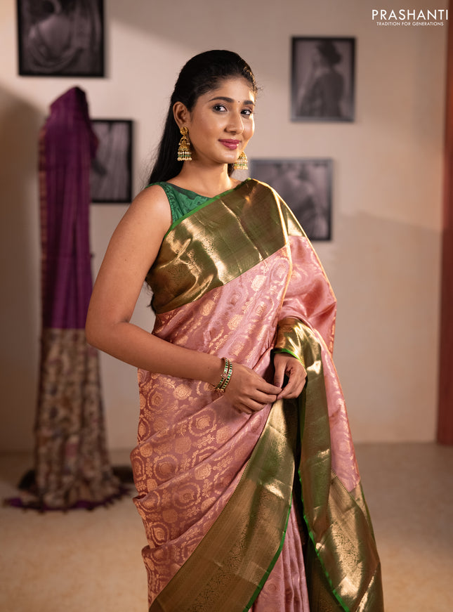 Pure kanchipuram silk saree mauve pink with allover zari woven brocade weaves and long zari woven border