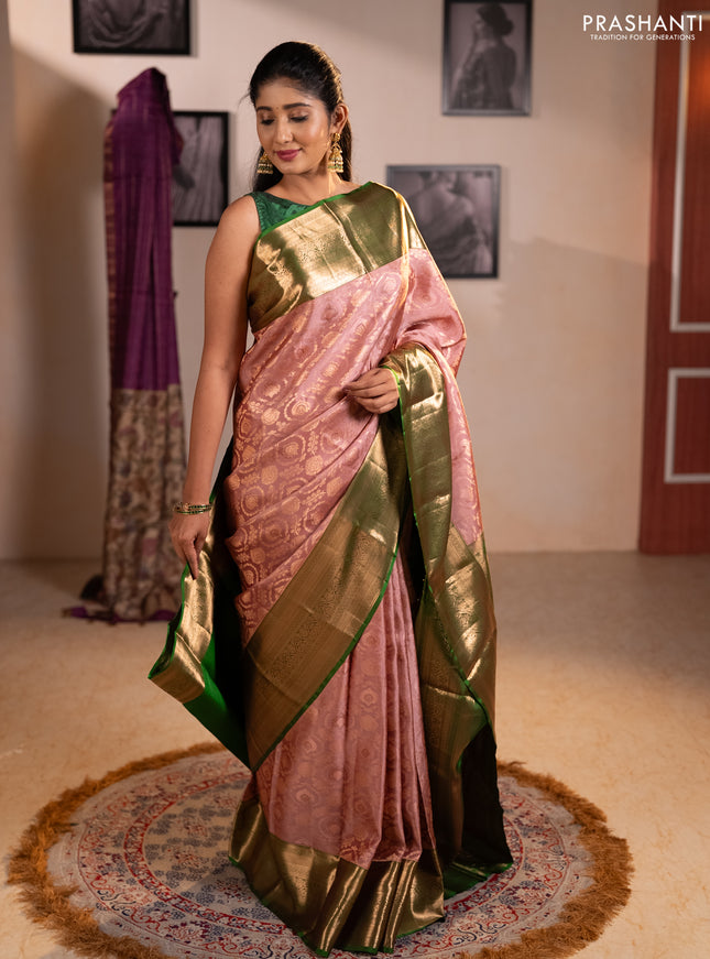 Pure kanchipuram silk saree mauve pink with allover zari woven brocade weaves and long zari woven border