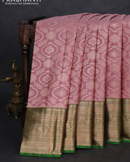 Pure kanchipuram silk saree mauve pink with allover zari woven brocade weaves and long zari woven border