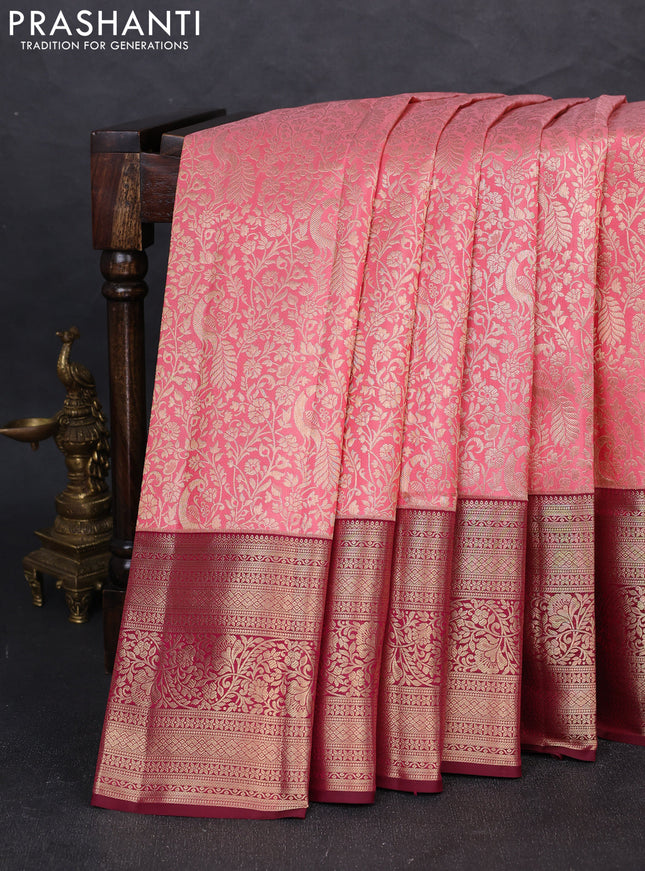 Pure kanchipuram silk saree peach pink and deep maroon with allover zari woven brocade weaves and long zari woven border