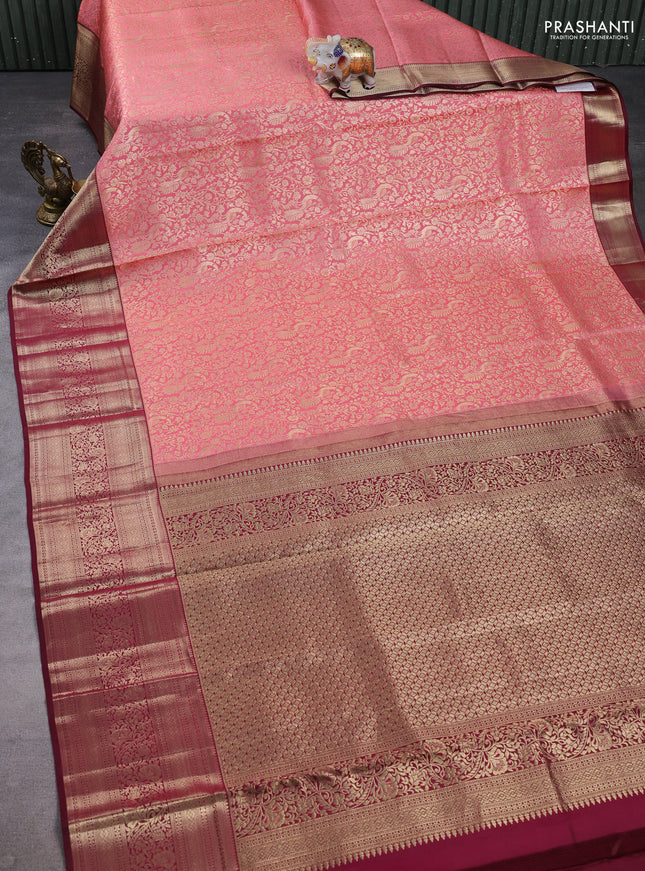 Pure kanchipuram silk saree peach pink and deep maroon with allover zari woven brocade weaves and long zari woven border