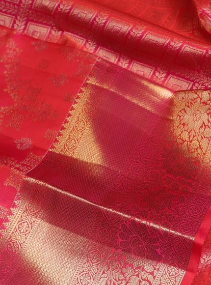 Pure kanchipuram silk saree dual shade of pinkish orange with allover zari woven brocade weaves and long zari woven border