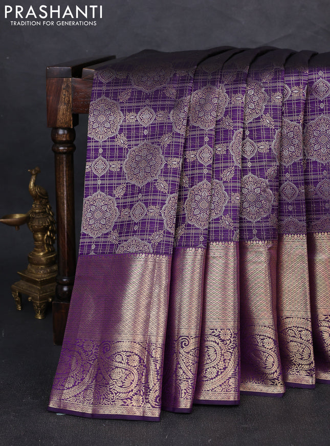 Pure kanchipuram silk saree deep purple with allover zari woven brocade weaves and long zari woven border
