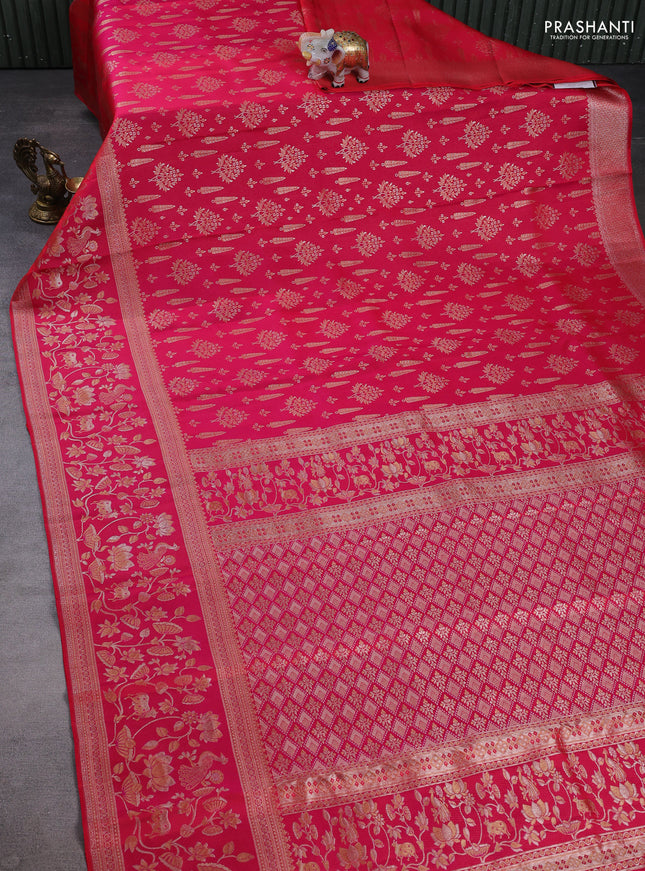 Pure kanchipuram silk saree dual shade of pinkish orange with allover zari woven brocade weaves and long zari woven border