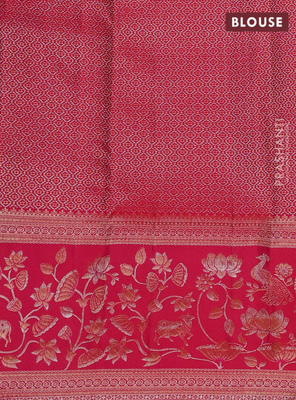 Pure kanchipuram silk saree dual shade of pinkish orange with allover zari woven brocade weaves and long zari woven border