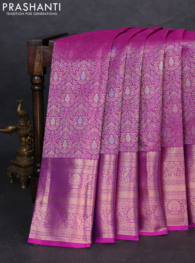 Pure kanchipuram silk saree magenta pink with allover zari woven brocade weaves and long zari woven border
