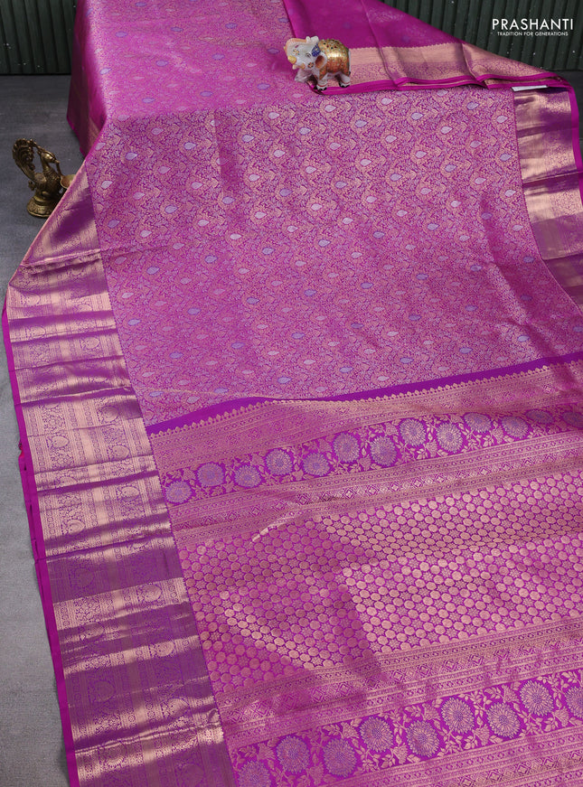 Pure kanchipuram silk saree magenta pink with allover zari woven brocade weaves and long zari woven border