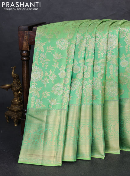 Pure kanchipuram silk saree light green with allover zari woven brocade weaves and long zari woven border
