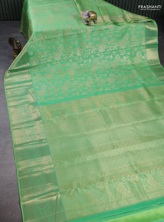 Pure kanchipuram silk saree light green with allover zari woven brocade weaves and long zari woven border